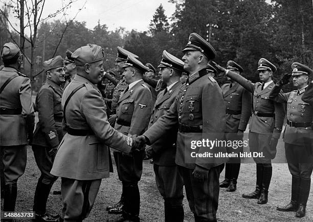 After Mussolini's arrival at the train station of the Fuehrer's headquarters 'Wolfsschanze' near Rastenburg in east Prussia: Benito Mussolini is...