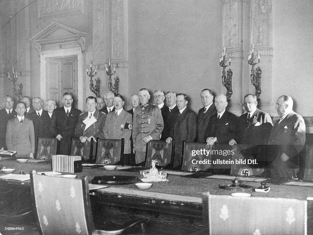 German Reich, Adolf Hitler and the members of the government of the Reich after their meeting in which they decided to reintroduce compulsory military service in Germany - undated - Vintage property o