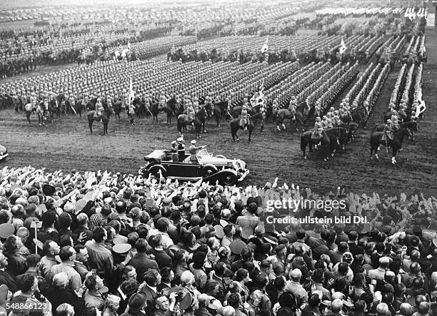 Nuremberg Rally 1938 Adolf Hitler taking the salute of a cavalry unit of the Wehrmacht at the rally ground- - - Photographer: Presse-Illustrationen...