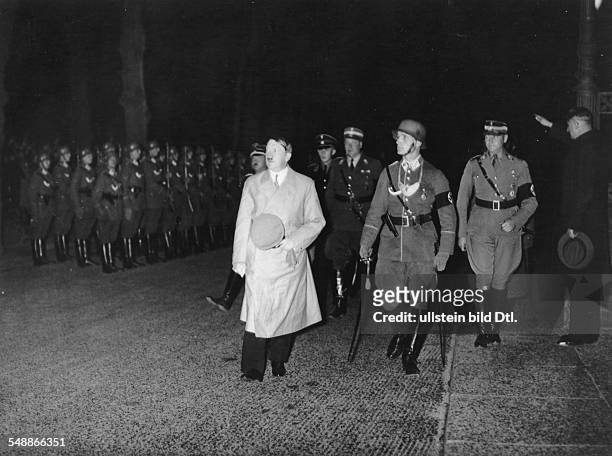 Adolf Hitler on his way to a meeting of SA leaders at the Reichs Ministry for Information and Propaganda in Berlin; Hitler with SA-Stabschef Viktor...