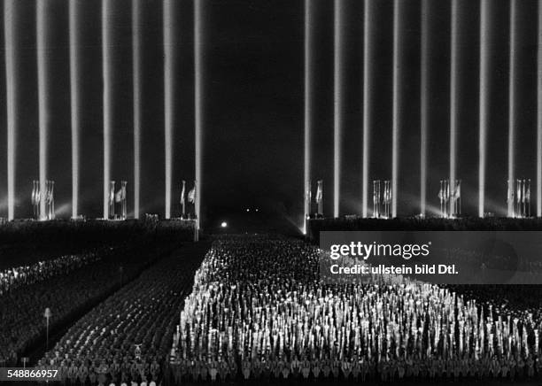 Nuremberg Rally 1937 The 'dome of light' over the rally ground during a mass parade at night - 1937 - Photographer: Presse-Illustrationen Heinrich...