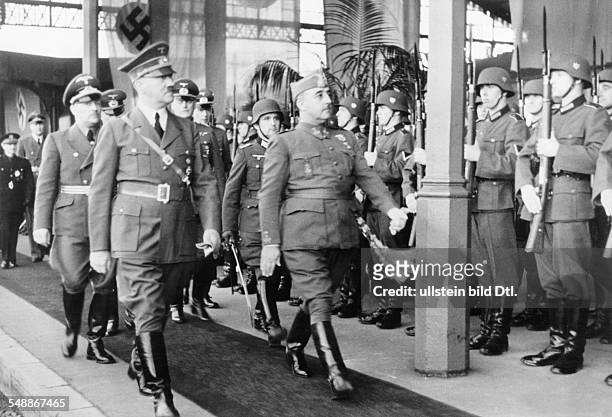 France, Hendaye: Adolf Hitler and Francisco Franco stepping out the Guard of Honour. On the right behind Hitler field marshall Wilhelm Keitel, Chief...