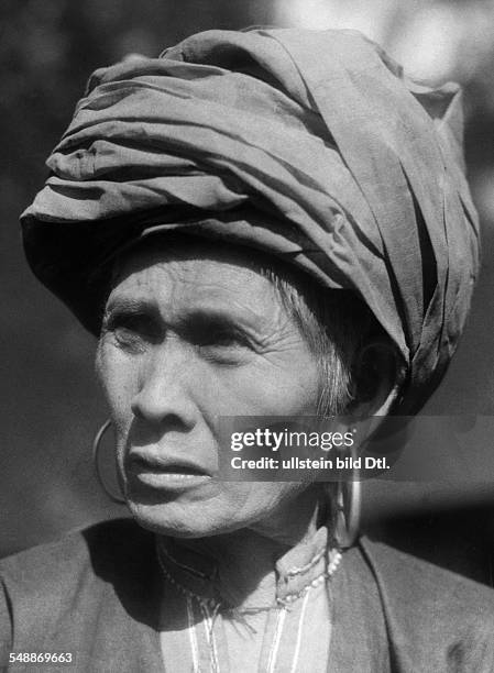 China: The New Year - celebrations: Portrait of the wife of the headman of the Lahu - tribe - ca. 1942 - Photographer: Hugo Adolf Bernatzik Vintage...