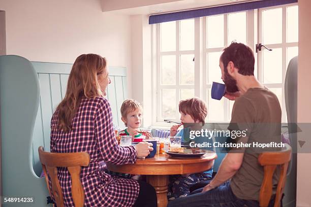 family breakfasting - family with two children foto e immagini stock