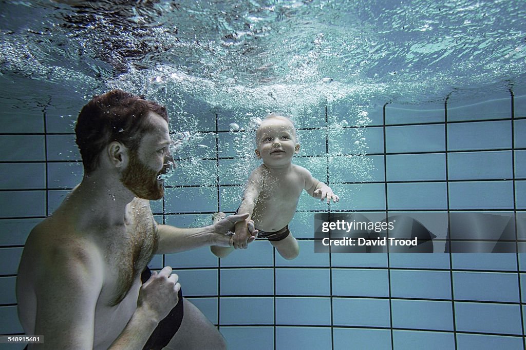 Child learning to swim.