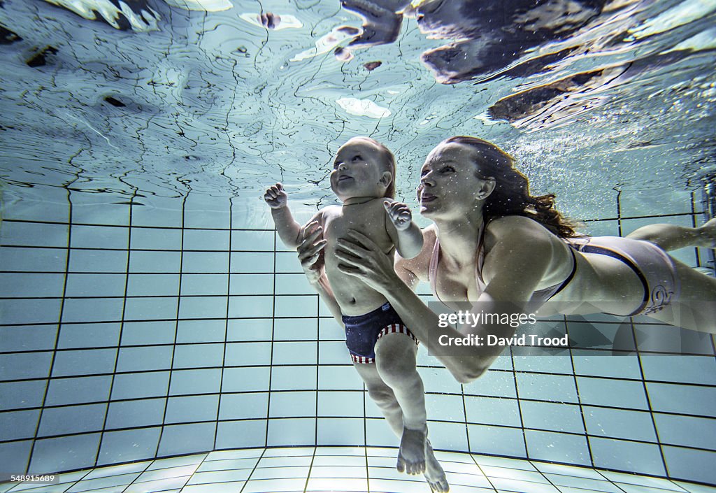 Child learning to swim.