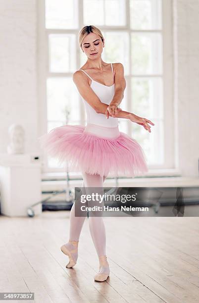 ballerina wearing tutu during rehearsing in studio - ballet dancers russia stock pictures, royalty-free photos & images