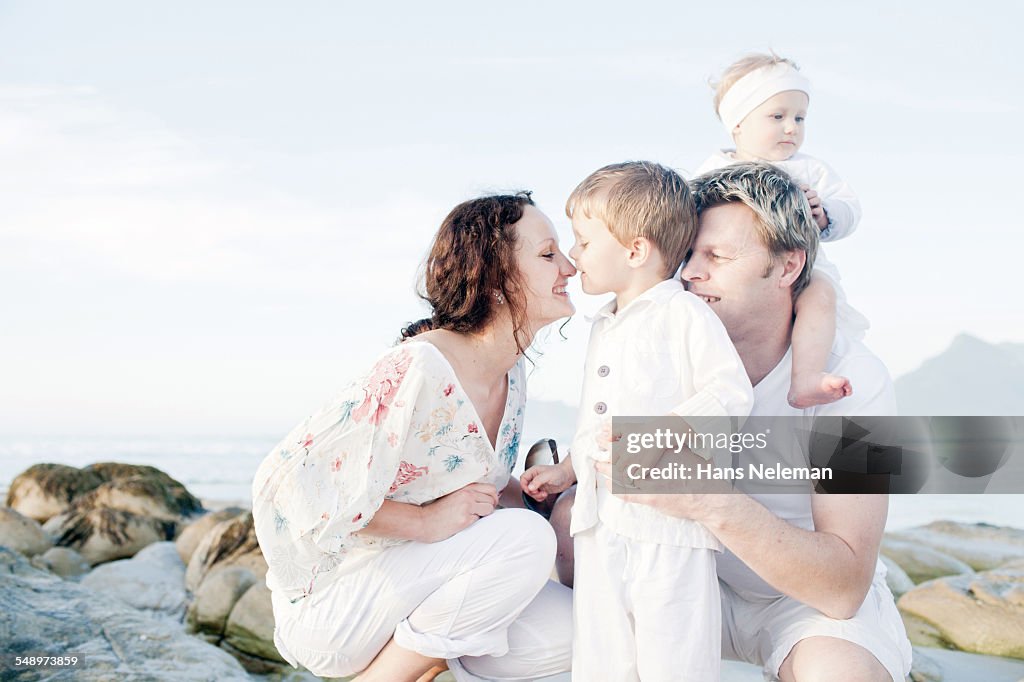 Happy family on the beach, portrait