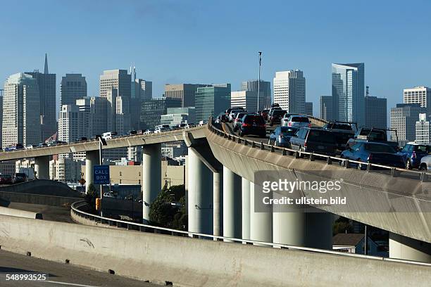 San Francisco: Traffic jam on the Freeway, skyline of central business district in the background.
