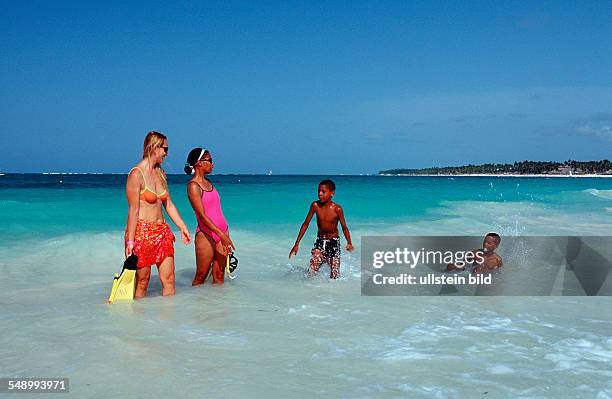 Two female scin diver on the beach, Punta Cana, Caribbean, Dominican Republic