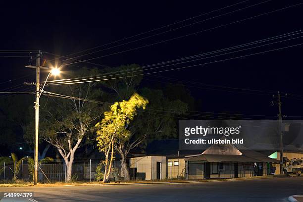 Night photography of the little town in the Western Australian outback. Iron Clad Hotel built in the 1890s, constructed of corrugated iron and listed...