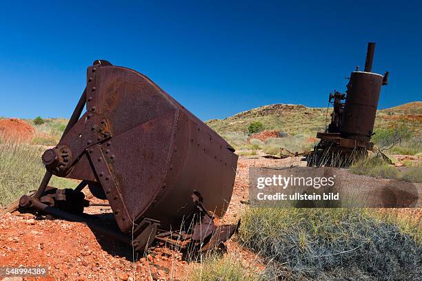 Rusted old equipment at an abandoned gold mining site in the outback of Western Australia.