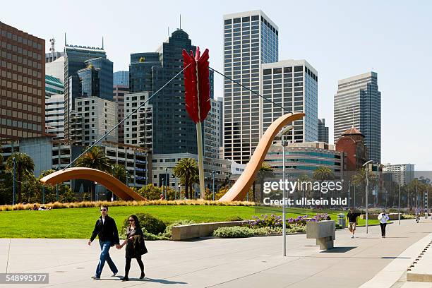 The sculpture CUPID'S SPAN by Claes Oldenburg and Coosje van Bruggen, was built in 2003 along the Rincon Park area on Embarcadero.