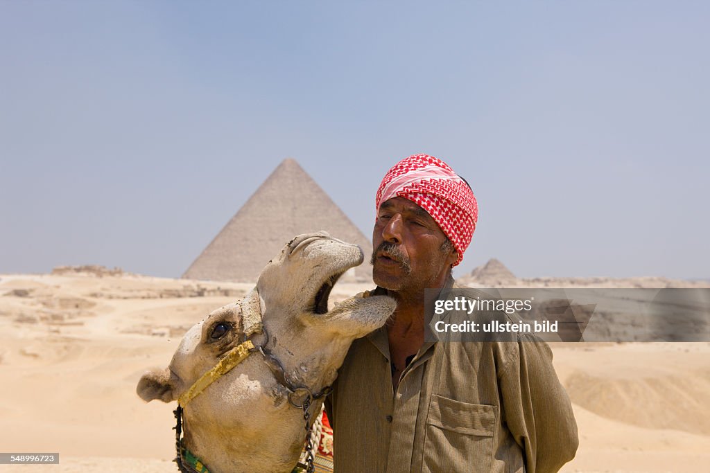 Camel Driver in Front of Pyramid of Cheops, Cairo, Egypt