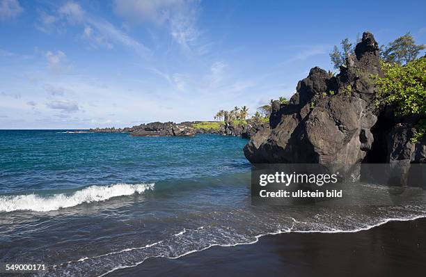Black Sand Beach at Waianapanapa State Park on Road to Hana, Maui, Hawaii, USA