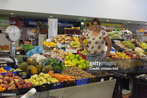 Portugal: Guimaraes: Market hall, fruit sale with seller