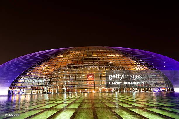 China, Beijing - The Concert Hall by night. Architect: Paul Andreu
