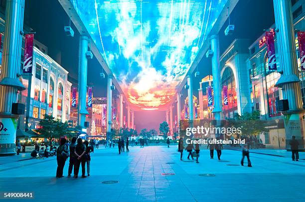 China, Beijing - Shopping mall The Place in Chaoyang district with Asia's biggest LED screen as ceiling.