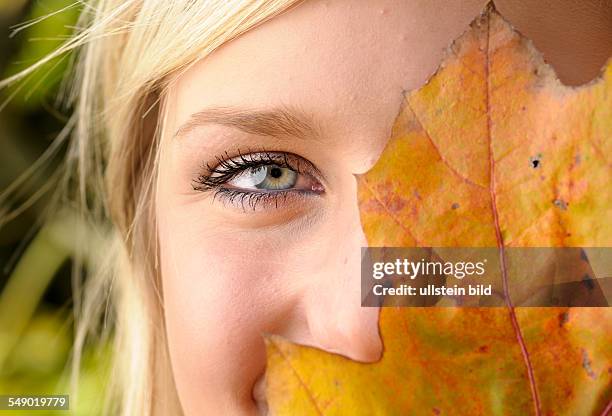 Young woman in autumn