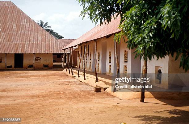 Abomey, Benin: The palace of King Guezo. Guezos palace courtyard and the rebuilt palace buildings. -