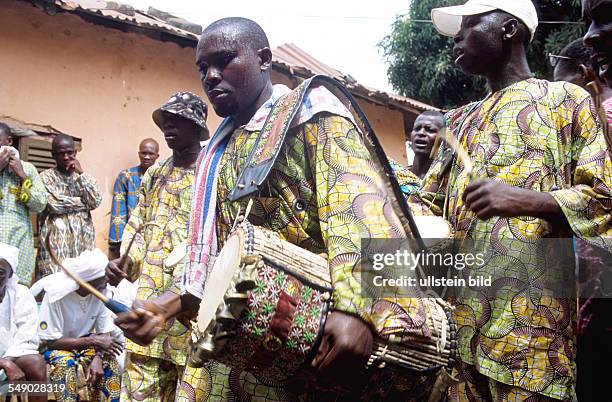 Benin, Ouidah: Egungun ceremony. The Egungun secret society are the ghosts of the ancestors who uphold tradition and punish wrongdoers.