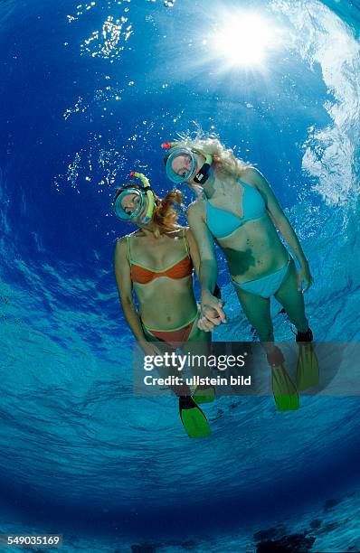 Two snorkeling girls, Bali, Indian Ocean, Indonesia