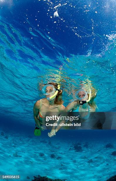 Two snorkeling girls, Bali, Indian Ocean, Indonesia