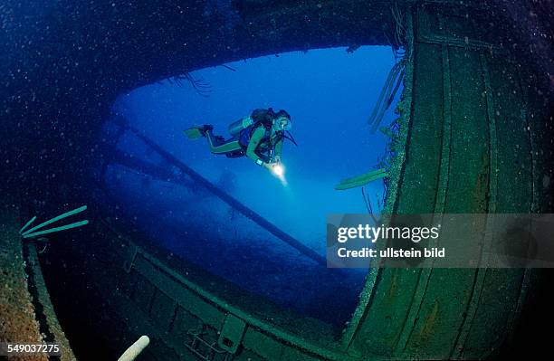 Scuba diver on the Hilma Hooker Ship Wreck, Netherlands Antilles, Bonaire, Caribbean Sea