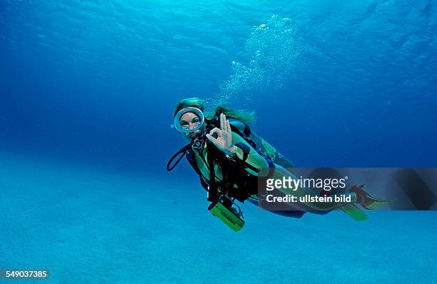 Scuba diver shows o.K. Signal, Netherlands Antilles, Bonaire, Caribbean Sea