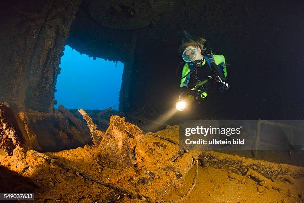 Diver discover Teapot inside of HIJMS Nagato Battleship, Marshall Islands, Bikini Atoll, Micronesia, Pacific Ocean