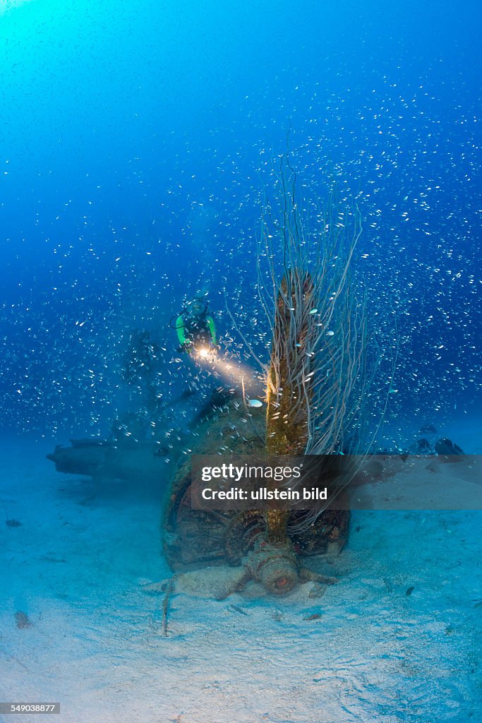 Diver and Propeller at Bomber near to USS Saratoga, Marshall Islands, Bikini Atoll, Micronesia, Pacific Ocean