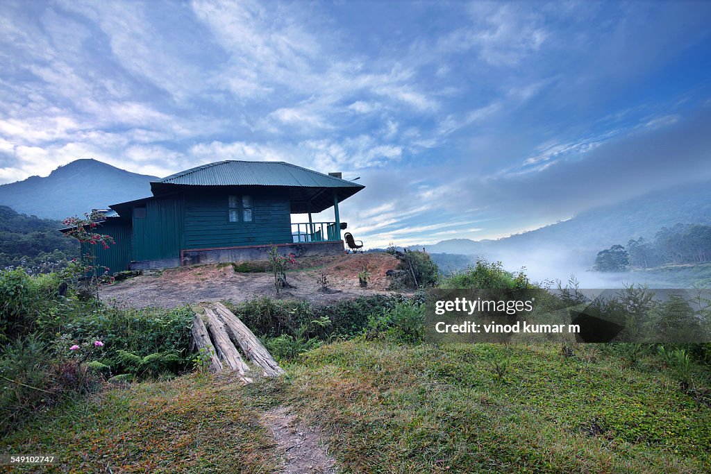 Log House in Pampadum Shola National Park,Munnar`