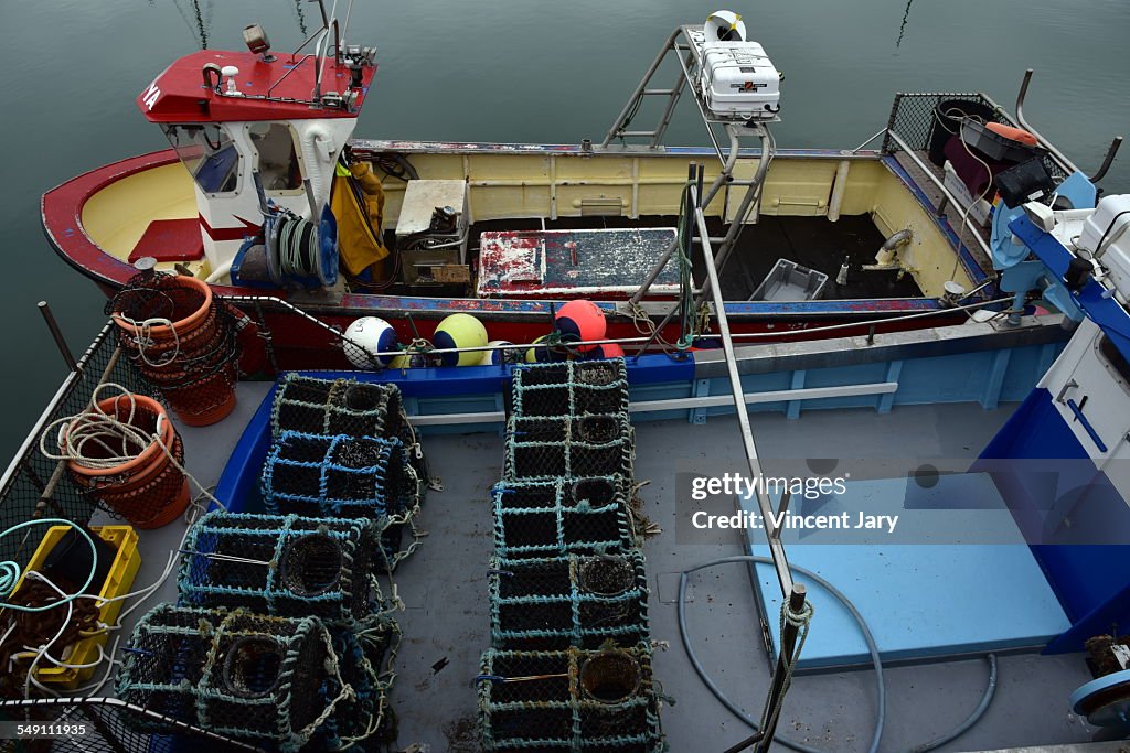 Fisher boat with locker fishing in Normandy