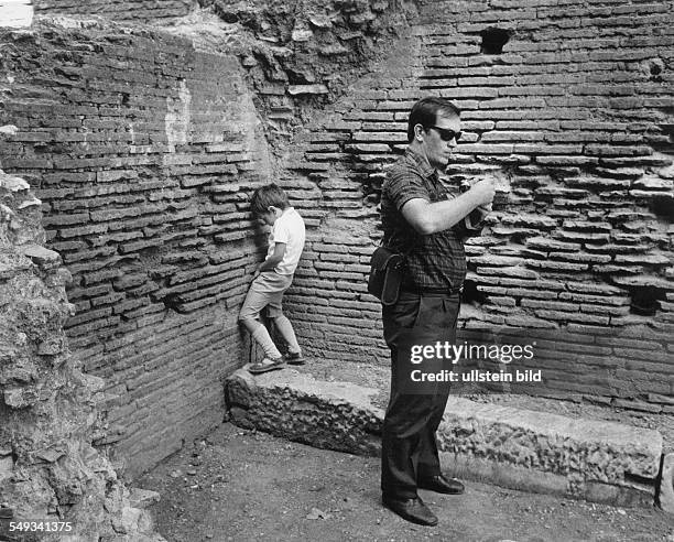 Piddling Definition 75 Wall Rom Stock Photos, High-Res Pictures, and Images - Getty Images