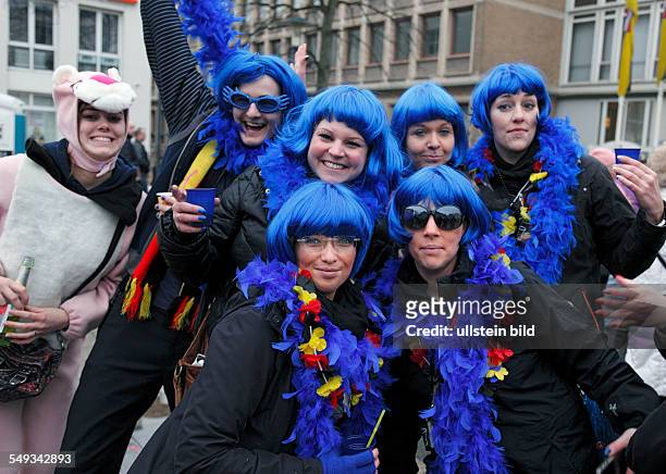 Rheinish Carnival in Krefeld, North Rhine-Westphalia, women with blue wigs on a parade at "Old Women Day" or "The Women's Day"