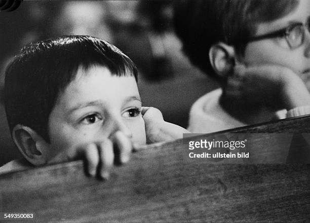 Germany, children watching a play in the childrens theater in Berlin, spectators, little boy