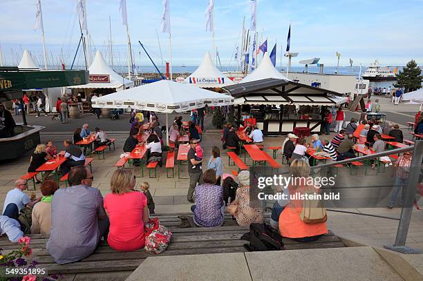 Kieler Woche 2011, Kiel-Schilksee, Olympic Centre Schilksee, beach cafe, sunshades, people, tourists