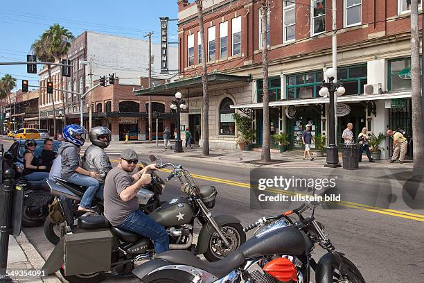 Biker on 7th Avenue in Ybor City near Tampa Florida