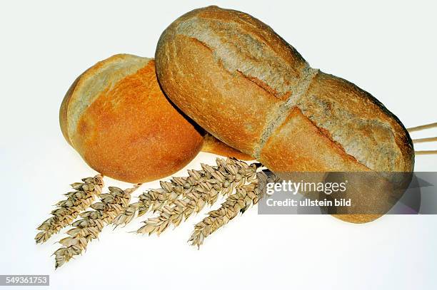 Bread rolls and wheat ear.