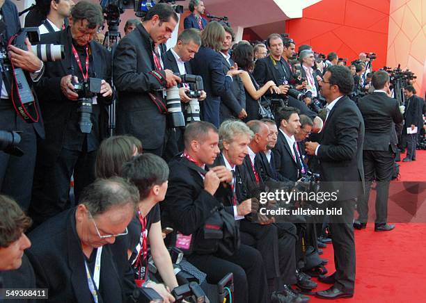Die Internationalen Filmfestspiele Venedig auf dem Lido in Venedig, Fotografen am Red Carpet