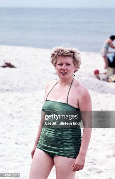 East Germany: Summer at the Baltic Sea, a woman on the beach, probably on Ruegen Island