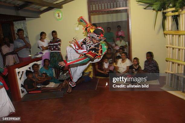 Sri Lanka, Kandy. A buddhist healing- and excorzist ceremony. Since 200 years in the fourth generation the Kaggadiya practise exorcism and astrology....