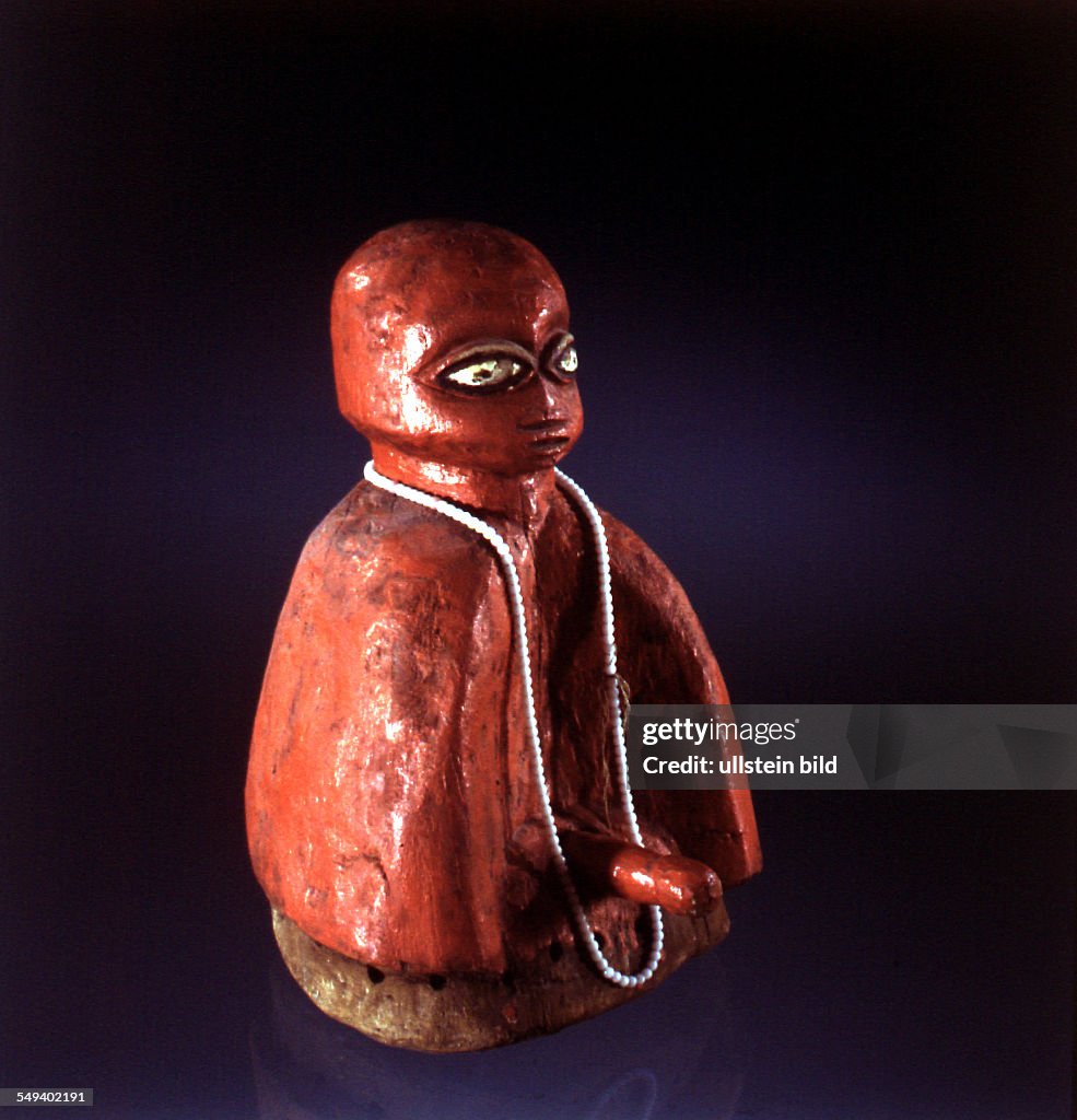 The mask of a Egungun costume. Legba divinity
