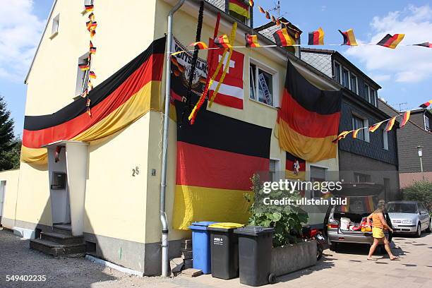 Germany, Reportage "Living at the highway 40". A housee during the European soccer championchip in 2008