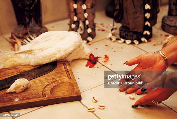 Germany, Wolfratshausen, Voodoo priest Caroline Huber, sacrificial ceremony