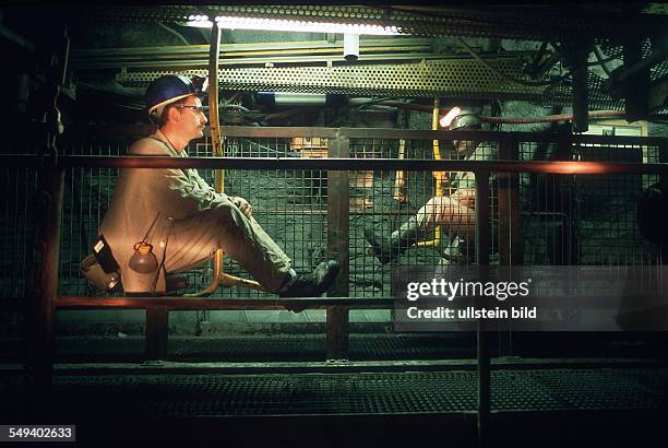 Germany, Hamm: Chair-lift, colliery Haus Aden Monopol. Workers on the chair-lift