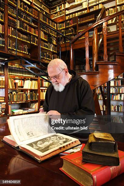 Germany, NRW, Werne: The oldest Capuchin monastery in the Rhenish-Westphalian Capuchin's province. Pater Suitberg in the library