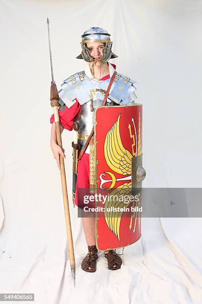 Germany, NRW, Bergkamen: A soldier of the Roman cohort LEGIO XV PRIMIGENIA on the museum festival