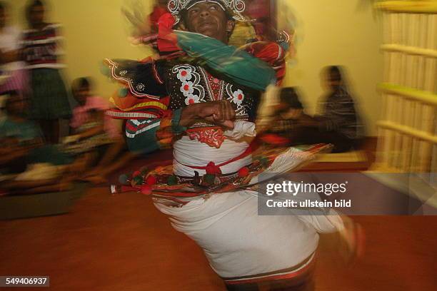 Sri Lanka, Kandy. A buddhist healing- and excorzist ceremony. Since 200 years in the fourth generation the Kaggadiya practise exorcism and astrology....