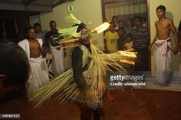 Sri Lanka, Kandy. A buddhist healer and excorzist. Since 200 years in the fourth generation the Kaggadiya practise exorcism and astrology. He also is...